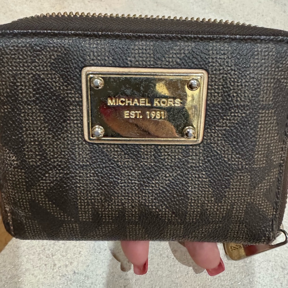 Michael Kors signature zip around wallet.